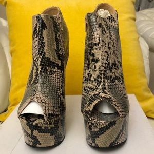 Snake print heel less wedges